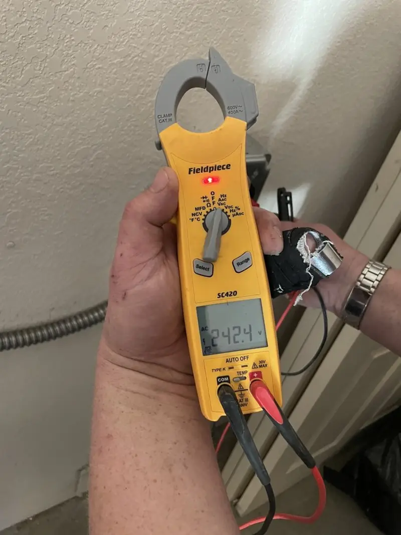 Voltage testing with clamp meter during Generator Installation in Madisonville